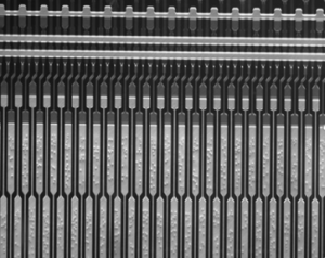 High-Resolution DIC Inspection of Conductive Particles & Circuit Patterns
