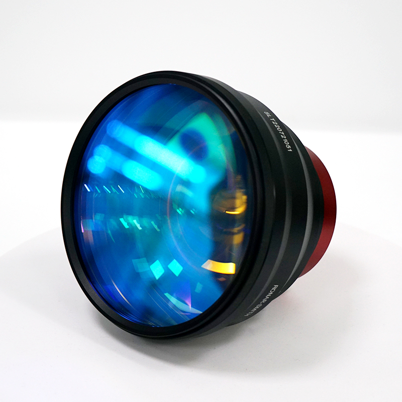 Close-up of SL-1064-94-163Q model number engraved on laser scan lens. 163mm EFL, 94x94mm scan field for industrial marking.