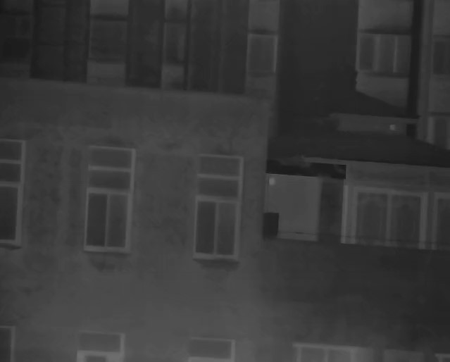Real-world thermal imaging sample captured by the 30-150mm all-chalcogenide zoom lens, demonstrating clear and detailed infrared imaging of urban buildings and landscapes. Ideal for long-range security surveillance, industrial inspection, and night vision applications.